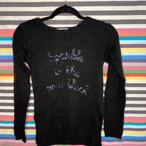 Black sweater with glitter letters
